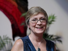 Rev. Gretta Vosper is seen at her West Hill United Church in Toronto on Wednesday, Aug. 5, 2015. Vosper, a committed atheist who does not believe in the Bible, is fighting a process that could see her defrocked for her views. THE CANADIAN PRESS/Colin Perkel
