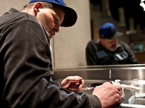 Razor, an intravenous drug user, uses the safe injection site Insite in Vancouver.
FILE PHOTO, 24 HOURS