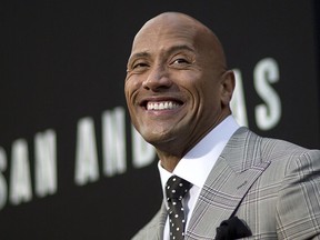 Dwayne "The Rock" Johnson will be one the first celebrities to hold live video broadcasts on Facebook.  REUTERS/Mario Anzuoni
