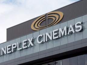 Signage is pictured on top of a Cineplex theatre on May 22, 2015 in Ottawa. THE CANADIAN PRESS/Adrian Wyld