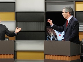 NDP leader Jack Layton (left) debates Liberal leader Michael Ignatieff
in Ottawa April 12, 2011. (Reuters Files)