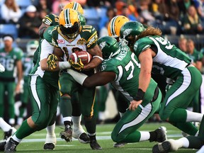 Chad Simpson, shown here in a pre-season game against Saskatchewan, will replace injured teammate Shakir Bell in Thursday's game in Vancouver. (Dale MacMillan, Edmonton Sun)
