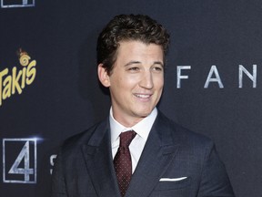 Miles Teller poses for a picture as he attends the "Fantastic Four" premiere in Brooklyn, New York on August 04, 2015.    AFP PHOTO / KENA BETANCUR