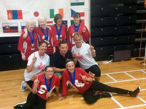 St. Thomas resident Emma Reinke, bottom left, and the rest of the Canadian junior goalball team proudly show off the gold medal they won at the world championship in Colorado Springs. Goalball is a sport designed for visually impaired athletes. The team beat four others for the top spot after three days of competition.