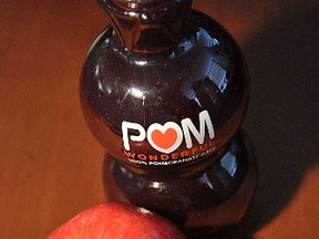 This October 19, 2010 file photo illustration shows a bottle of POM Wonderful pomegranate juice. (AFP PHOTO/Karen BLEIER)