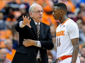 Head coach Jim Boeheim of the Syracuse Orange talks with Kaleb Joseph during play against the Kennesaw State Owls at the Carrier Dome on November 14, 2014 in Syracuse, N.Y. (Rich Barnes/Getty Images/AFP)