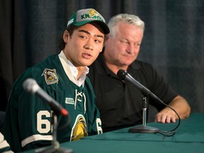 Kole Sherwood of Columbus, Ohio, talks at a press conference at Budweiser Gardens on Wednesday as London Knights head coach Dale Hunter looks on. Sherwood is one of 12 American players on the Ontario Hockey League team?s rosters. (CRAIG GLOVER, The London Free Press)