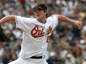 Baltimore Orioles lefty Adam Loewen pitches against the New York Yankees in his first major league start. Nearly a decade later, Loewen is back in the bigs as a pitcher. (REUTERS/Joe Giza)