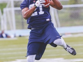 Vidal Hazelton, one of three first-year wide receivers on the Argos making his mark in the CFL this season, hauls in a catch during practice at Downsview Park. (DAVE THOMAS, Toronto Sun)