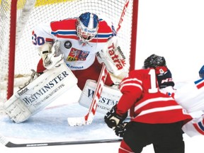 Canadian forward Mathew Barzal is robbed by Czech goaltender Karel Vejmelka in Canada’s 6-2 win on Thursday in Calgary. (Darren Makowichuk/POSTMEDIA NETWORK)