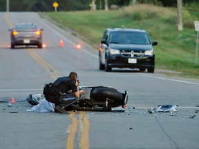 A Norfolk man was killed Thursday evening in a collision between a motorcycle and pickup truck at the intersection of Teeterville Road and Brantford Road. The man killed was riding a motorcycle. A passenger in the pickup truck was also killed. Charges are pending against a Woodstock man who was at the wheel of the pickup. (DAVID RITCHIE photo)