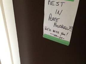 A makeshift memorial outside Andrew Loku's door in Toronto on Monday July 6, 2015. (Maryam Shah/Toronto Sun)