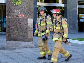 Firefighters responded to a fire in the underground parking lot of One London Place Friday morning. MORRIS LAMONT / THE LONDON FREE PRESS