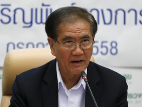Thailand's Public Health Minister Rajata Rajatanavin speaks during a news conference at the compound of the Public Health Ministry in Nonthaburi province, on the outskirts of Bangkok, Thailand, July 29, 2015. Thailand announced its new surrogacy law will be effective from July 30 onwards and sets provisions barring surrogacy from being commericalized. (REUTERS/Chaiwat Subprasom)