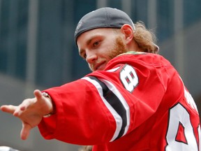 Blackhawks right wing Patrick Kane acknowledges the crowd during the 2015 Stanley Cup championship parade and rally at Soldier Field in Chicago on June 18, 2015. Kane is the subject of an investigation by Hamburg, N.Y. police into an alleged incident at the player's home. (Jon Durr/USA TODAY Sports)