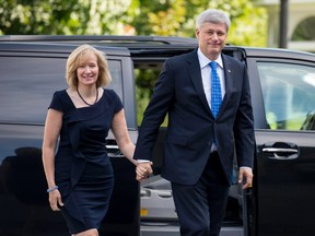 Prime Minister Stephen Harper, along with his wife Laureen, visits Governor General David Johnston at Rideau Hall in Ottawa on Sunday, August 2, 2015, to dissolve Parliament and trigger an election campaign. (THE CANADIAN PRESS/Justin Tang)