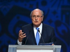 FIFA President Sepp Blatter appears at the preliminary draw for the 2018 World Cup in St. Petersburg, Russia on July 25, 2015. FIFA has launched an internal investigation of alleged corruption following the arrests of current and former soccer officials, and sports marketing executives. (Reuters/Stringer)