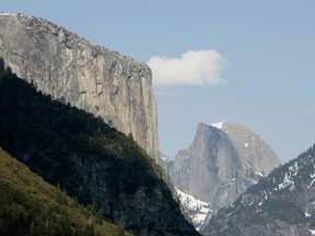 Yosemite Valley, with the world-famous granite monolith of El Capitan (L) and Half Dome (R), is seen in Yosemite National Park in California in this file photo from April 7, 2008. (REUTERS/Darrin Zammit Lupi/Files)