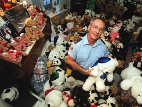 Const. Barry Small, seen here in December 2000, surrounded by the teddy bears he had collected to deliver to children in hospital over Christmas. The 40-year veteran of the Toronto Police Service died earlier this week at the age of 67. (Toronto Sun file photo)