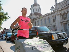 Eddy Dostaler, a.k.a. Fast Eddy Canada, makes a stop in Kingston this week on his cross-country running tour of Canada. (Julia McKay/The Whig-Standard)