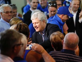 Prime Minister Stephen Harper thanks supporters following his speech during a campaign stop at Anderson Equipment on Wallbridge-Loyalist Road, on Friday August 7, 2015 in Belleville, Ont. Emily Mountney-Lessard/Belleville Intelligencer/Postmedia Network