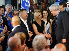 INTELLIGENCER FILE PHOTO
Stephen Harper meets with Conservative candidate Jodie Jenkins and his wife Shauna, during a campaign visit in Belleville.