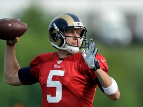 St. Louis Rams quarterback Nick Foles throws during training camp at the NFL football team’s practice facility Thursday, Aug. 6, 2015, in St. Louis. (AP Photo/Jeff Roberson)