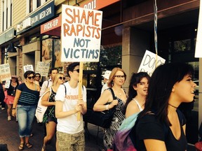 Edmontonians march down Whyte Avenue Saturday afternoon in the fifth annual Slut Walk. KEVIN MAIMANN/EDMONTON SUN/POSTMEDIA NETWORK