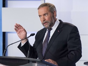 NDP Leader Thomas Mulcair makes a point during the first leaders debate Thursday, August 6, 2015 in Toronto. (AFP PHOTO / Pool / FRANK GUNN)