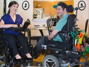 Stella Palikarova, left, and Andrew Morrison-Gurza are pictured in Stella's Toronto apartment on Thursday, June 18, 2015. (THE CANADIAN PRESS/Chris Young)