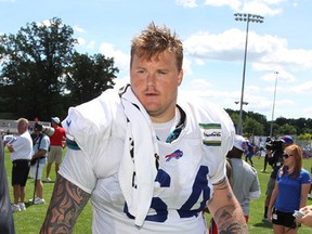 Buffalo Bills guard Richie Incognito (64) walks from the field at the teams NFL football training camp in Pittsford, N.Y., Sunday, Aug. 2, 2015. (AP Photo/Bill Wippert)