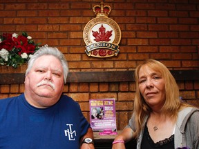 Allen Revelle and Roxanne Warren pose for a photo at the Royal Canadian Legion 560 in Kingston. The two are helping co-ordinate a fundraiser - For the Love of Kaitlan - with the family to help raise awareness about domestic violence and to help support the three children of the late Kailtan Babcock, who was murdered in her home in June. (Julia McKay/The Whig-Standard)