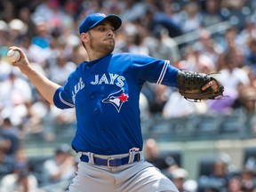 Blue Jays starter Marco Estrada throws against the Yankees on Sunday. The right-hander went 6 1/3 innings, allowing three hits while striking out six for his 10th victory of the season. (USA Today Sports)
