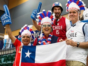 Team Chile fans cheer on their team during the opening game against the Dominican Republic at the 2015 FIBA Americas Championship for Women at the Saville Community Sports Centre on Sunday. David Bloom/Edmonton Sun