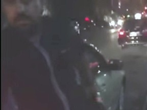 In this framegrab, a man gets out of a vehicle after what a group of Ottawa cab drivers say was an Uber sting. The unhappy cabbies are taking the videos in an effort to force the city to charge more Uber drivers. (YouTube frame grab Ottawa Sun / PostMedia Network)
