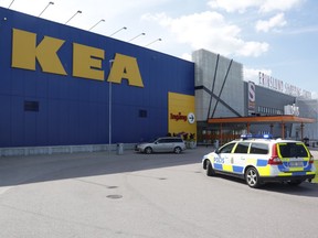A police car is seen in front of an Ikea store in Vasteras, central Sweden, August 10, 2015. Two people were killed and one seriously injured in a knife attack at an IKEA store in the city of Vesteras, about an hour west of the Swedish capital Stockholm, police said on Monday. REUTERS/Peter Kruger/TT News Agency