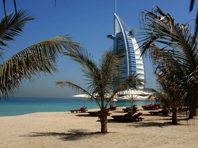 A picture taken on May 14, 2015 shows a view of Dubai's Burj al-Arab hotel seen from the Mina al-Salam beach hotel and touristic resort in Jumeirah. AFP PHOTO / PATRICK BAZ