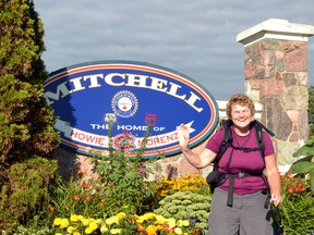 Ruth Garrett, a cancer survivor who began walking from Collingwood to London on Aug. 1 and will continue walking to Barrie once she reaches London, passed through Mitchell early last Sunday, Aug. 9. Garrett is walking to raise money for the Gilda's Group, an organization that provides social and emotional support to individuals and families afflicted by cancer. GALEN SIMMONS/MITCHELL ADVOCATE