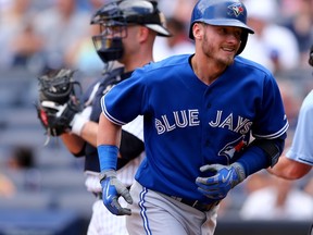 Jays third baseman Josh Donaldson celebrates his home run versus the Yankees on Sunday. (AFP)