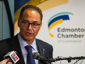 Alberta Finance Minister Joe Ceci speaks to the media after a meeting with Edmonton Chamber of Commerce president and CEO Janet Riopel at the chamber in Edmonton, Alta., on Monday August 10, 2015. Ian Kucerak/Edmonton Sun/Postmedia Network