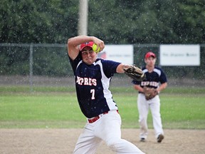 Napanee Abundant Insulation Express’s Luke Severson pitches in a rainy round-robin game against Quebec St-Leonard-d’Aston Express at the 2015 U21 Men’s Canadian Fast Pitch Championship in Napanee. The tournament is an example of sports tourism the town of Napanee has been able to attract. (Meghan Balogh/Postmedia Network)