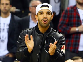Drake at a Raptors game in Toronto. (Dave Abel/Toronto Sun)