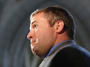 Scott Andrews pauses while speaking to journalists on Parliament Hill in Ottawa May 27, 2013.    REUTERS/Chris Wattie/Files