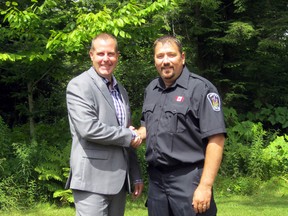 SUBMITTED PHOTO
Adam Burr, from Re/Max Quinte and a volunteer firefighter with Quinte West Station #1, and Jason Forth, full-time firefighter with Quinte West Fire and Emergency Services, encourage golfers to hit the greens on Aug. 22, for the fourth annual Frank LeClair Memorial Golf Tournament at Roundel Glen Golf Course.