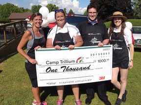 Andy's Drive-In co-owner Michele Docker, left, with Tracey Lezizidis, Strategic Marketing Manager, 3M Canada, and 3M Canada's Alex Figol and Megan Wylie, partnered on Monday, August 3 to raise money for Camp Trillium. 3M donated $1,288, and Andy's Drive-In contributed another $800. (CHRIS ABBOTT/TILLSONBURG NEWS)