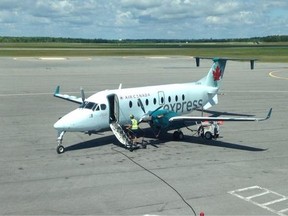 A Toronto-bound flight with 17 passengers and two crew on board made an emergency landing in Kingston after smoke was reported in cabin. Elliot Ferguson/The Whig-Standard