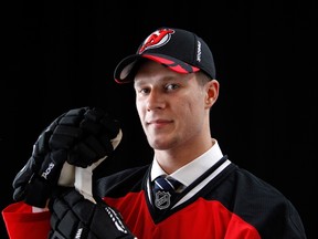 Sixth overall pick Pavel Zacha of the New Jersey Devils poses for a portrait during the 2015 NHL Draft at BB&T Center on June 26, 2015 in Sunrise, Florida. (Mike Ehrmann/AFP)