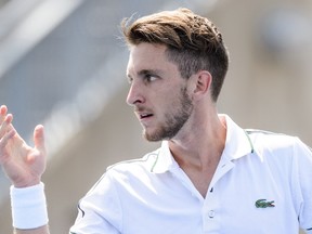 Filip Peliwo of Canada calls for a ball during Day 1 of the Rogers Cup at Uniprix Stadium on August 10, 2015 in Montreal, Quebec, Canada. Sergiy Stakhovsky defeated Peliwo 6-1, 5-7, 6-2. (Minas Panagiotakis/Getty Images/AFP)