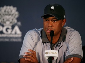 Tiger Woods speaks to the media during a press conference in a practice round prior to the PGA Championship at Whistling Straits on August 11, 2015 in Sheboygan, Wisconsin. (Andrew Redington/Getty Images/AFP)