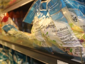 Salad mix bags lining grocery store shelves have been linked to past outbreaks of Cyclosporo. Even greens in a bag or bin need to be washed at home, said Elaine Reddick, Oxford County public health's supervisor for health protection. (MEGAN STACEY/Sentinel-Review)
